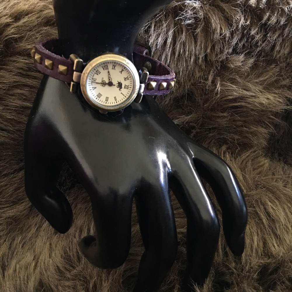 Ladies Elephant brown studded leather band watch